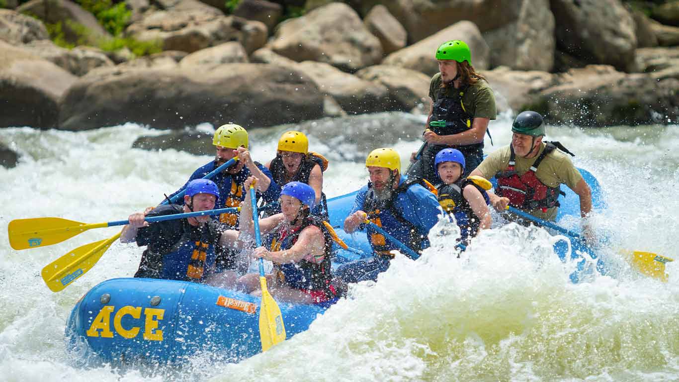Group enjoying a rafting trip with ACE Adventure Resort