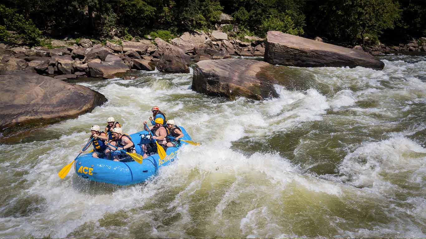 Guests rafting with ACE Adventure Resort