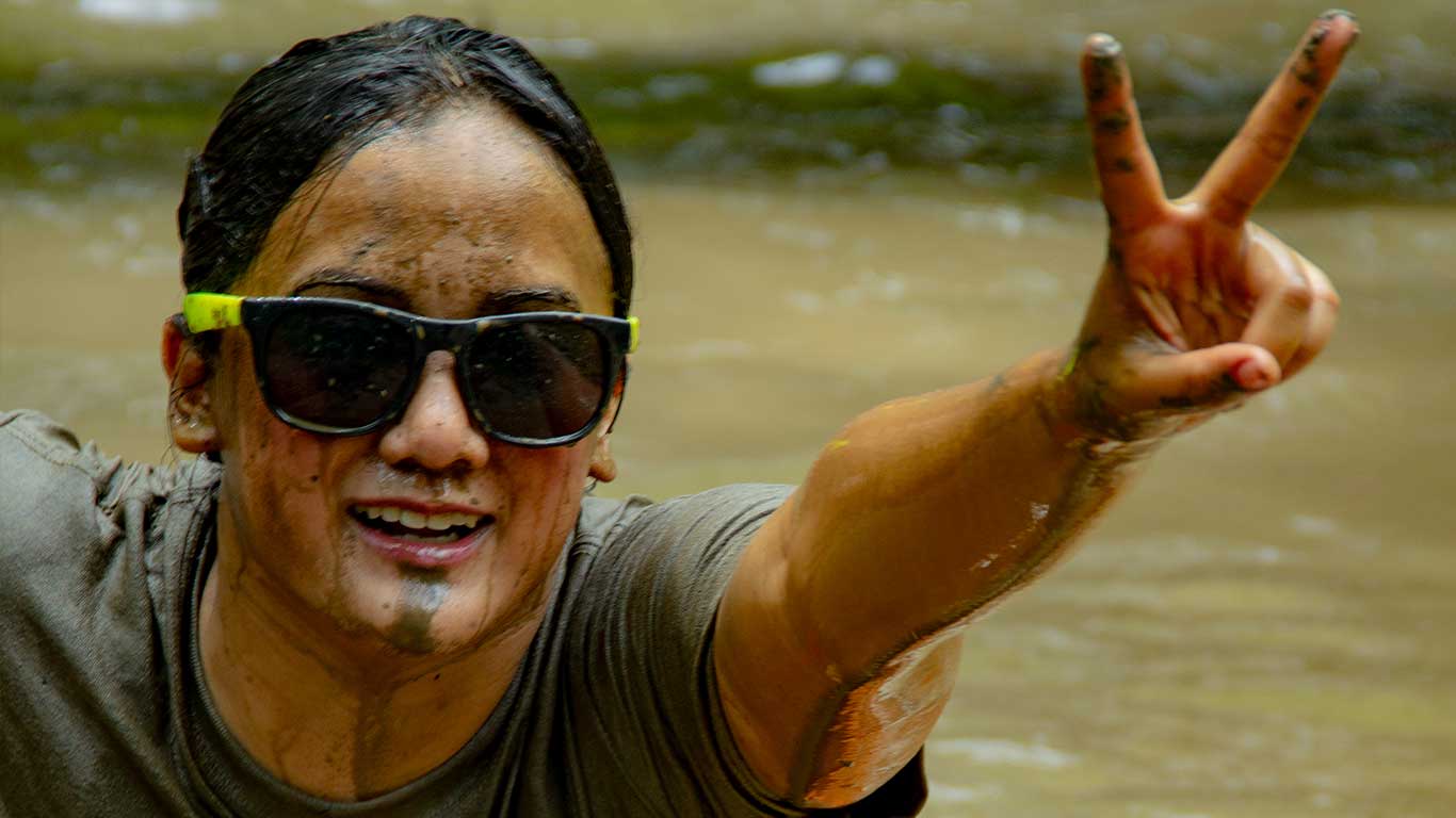 Girl posing at the mud run