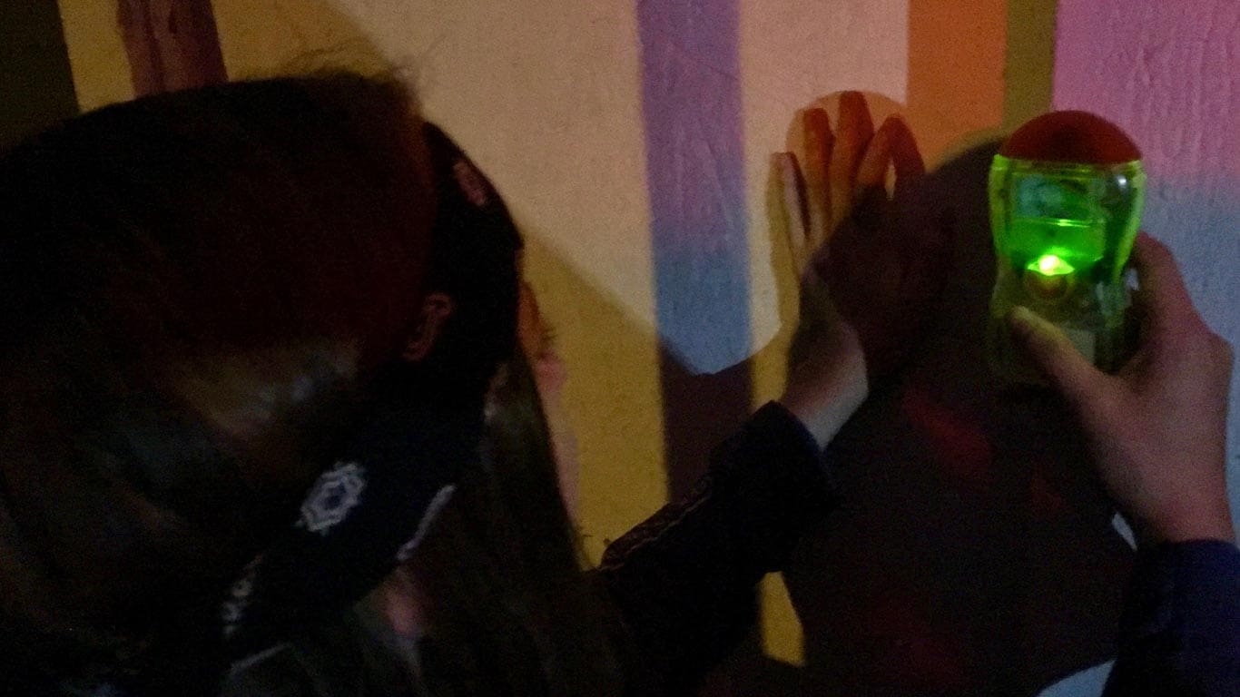 A Woman ghost hunting at Thurmond Ghost Hunt